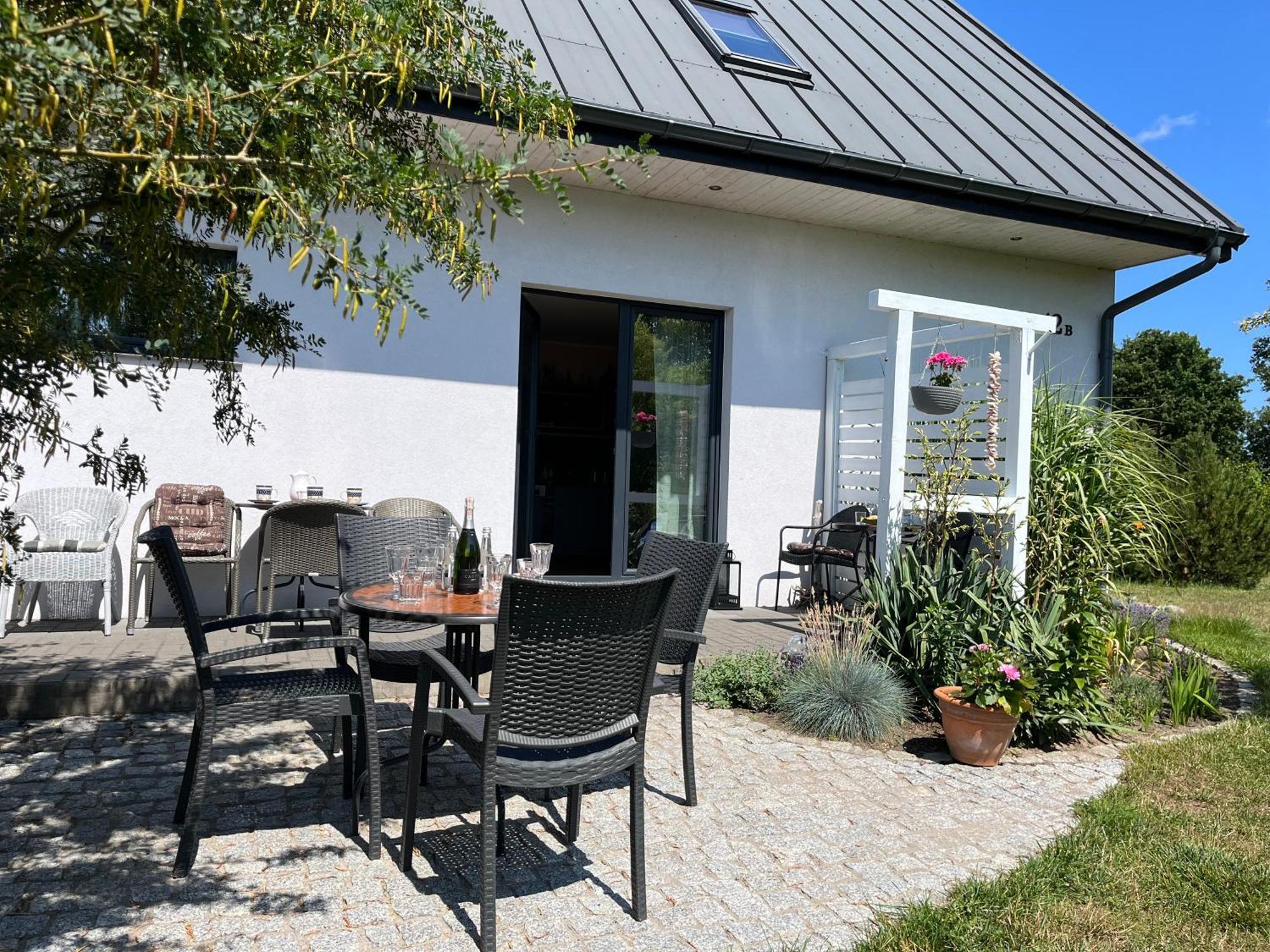 Dom W Trawach Apartman Smoldzinski Las Kültér fotó